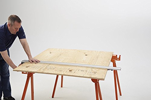 A circular saw guide rail on a table