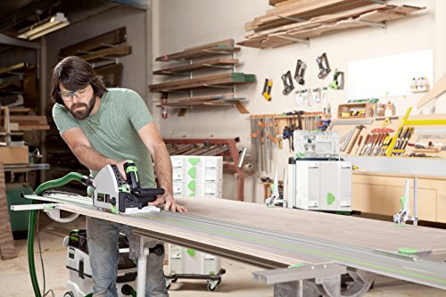 man using track saw