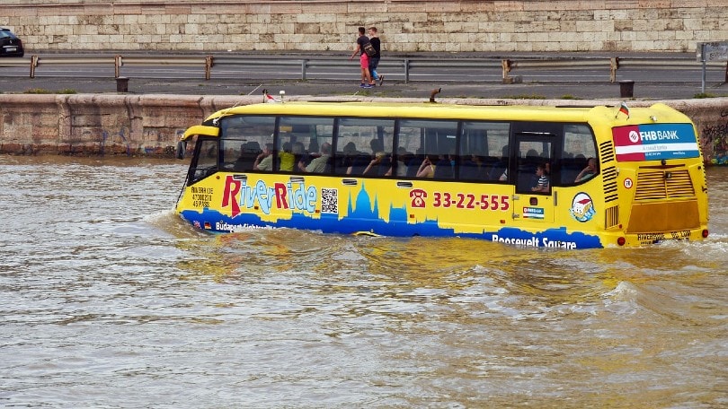 bus stranded in a flooded road