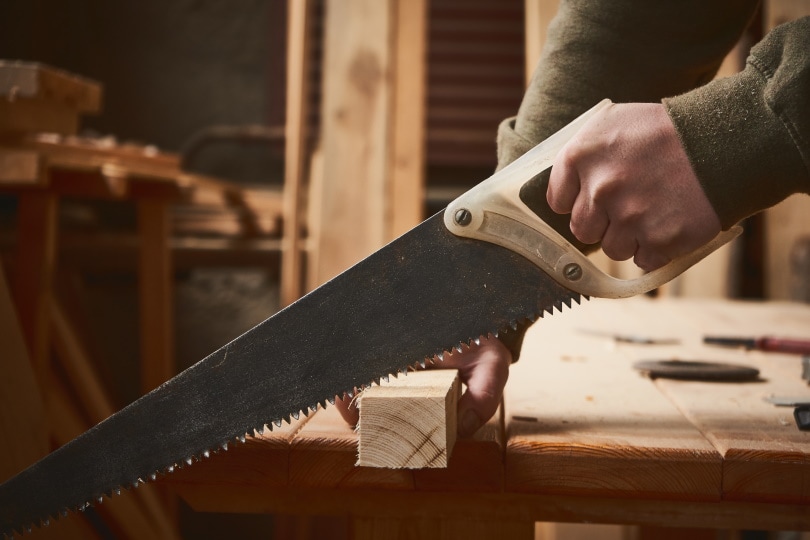 carpenter cutting wood