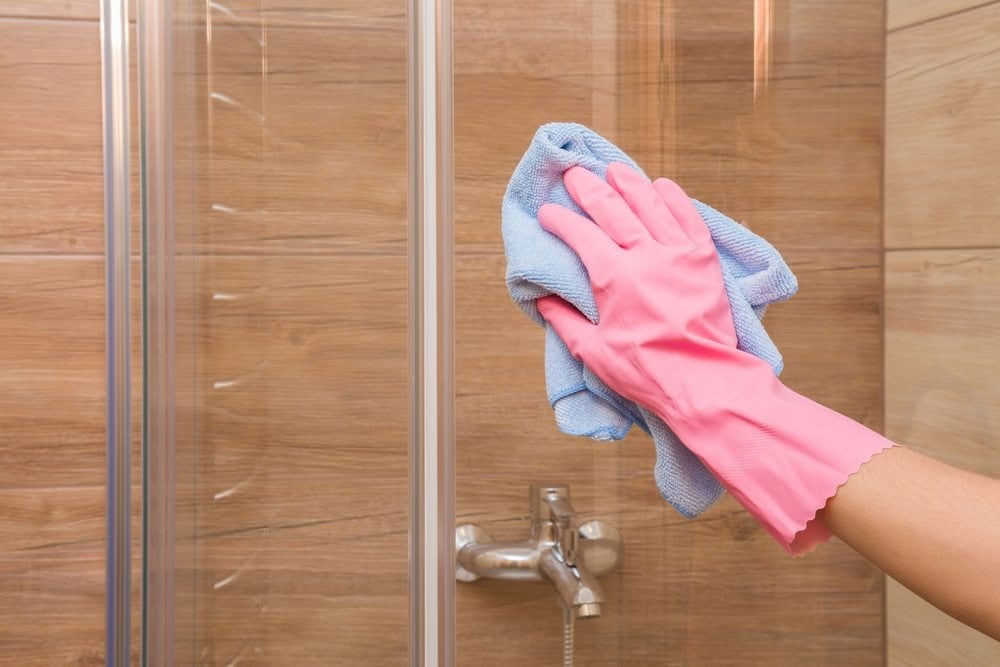 cleaning a glass shower door