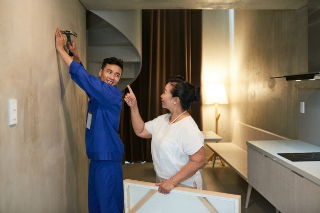 client talking to the handyman