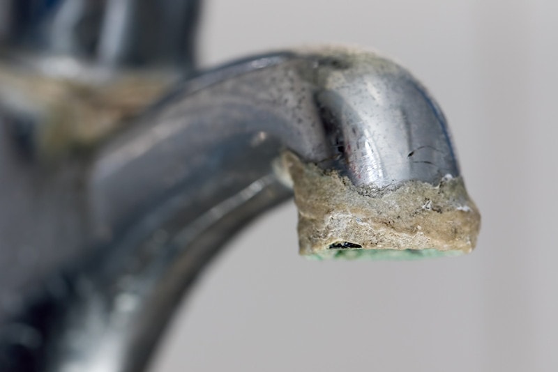 Close-up of limescale build-up