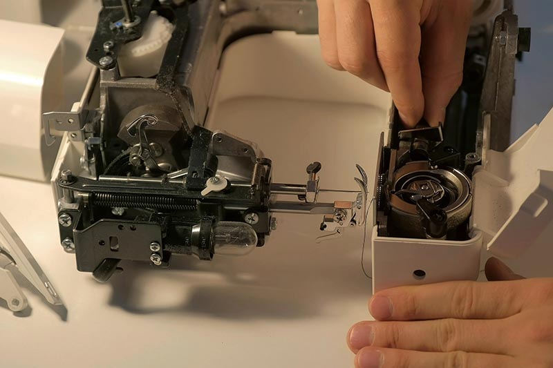 disassembling sewing machine