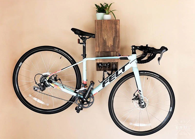 DIY Wall Mounted Bike Rack from DIY Huntress