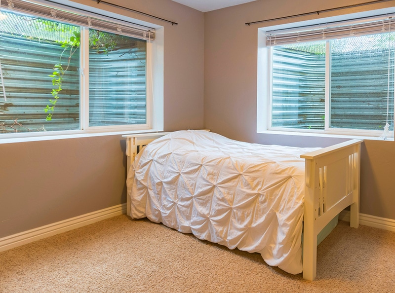 Double window in basement bedroom