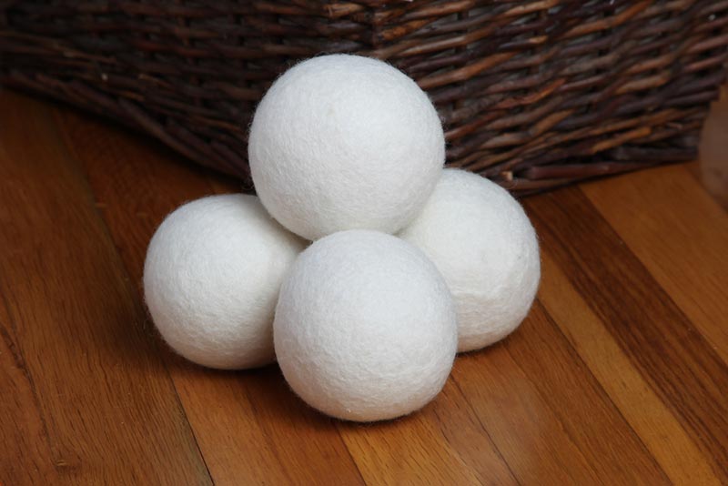 dryer balls on wooden floor