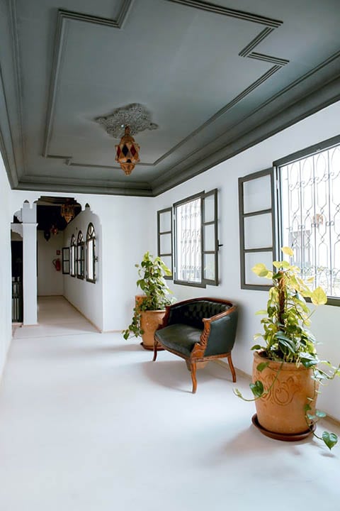 hallway with accent ceiling