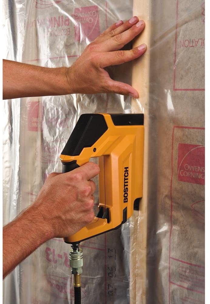 hand using BOSTITCH Air Compressor