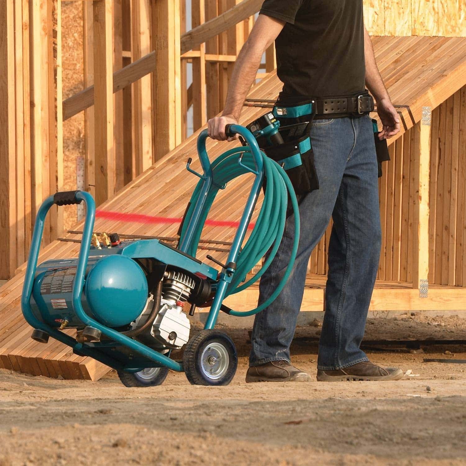 man pulling Makita MAC5200 Big Bore 3.0 HP Air Compressor
