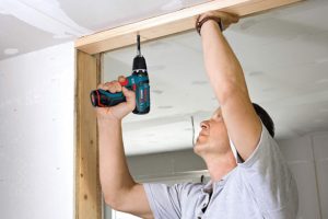 man using Bosch Power Tools Drill