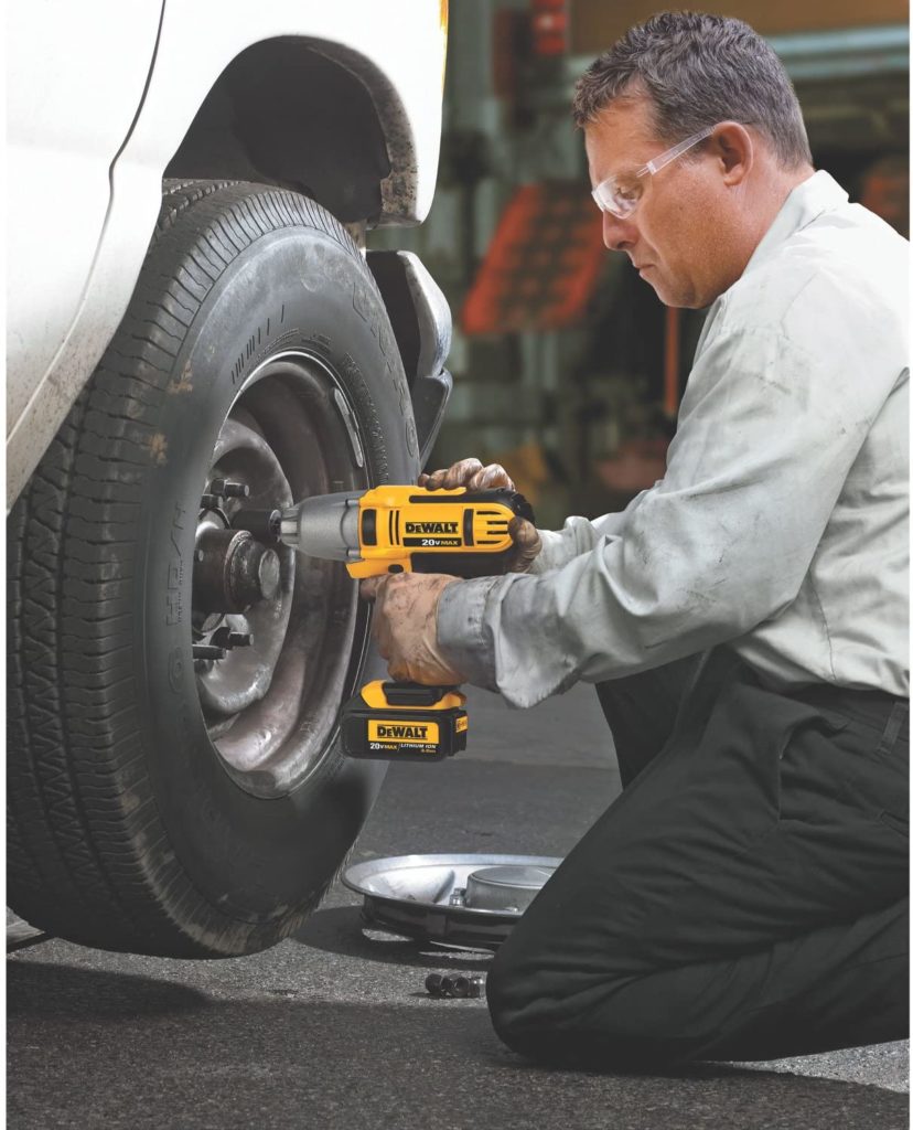 man using DEWALT DCF889B