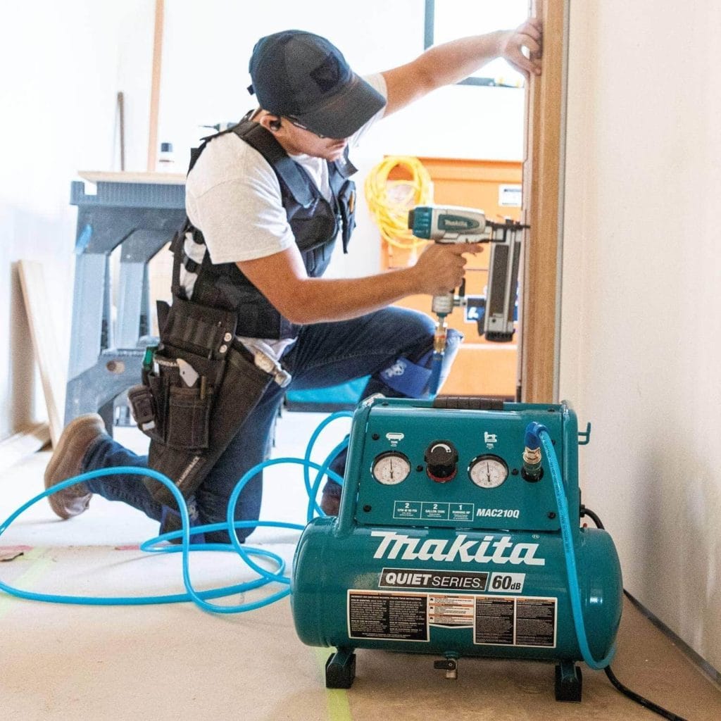 man using Makita MAC210Q Electric Air Compressor