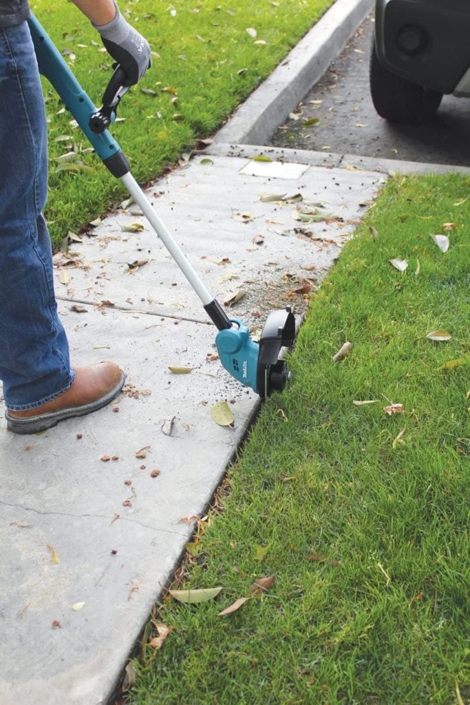 man using Makita XRU02Z LXT Lithium-Ion Cordless String Trimmer