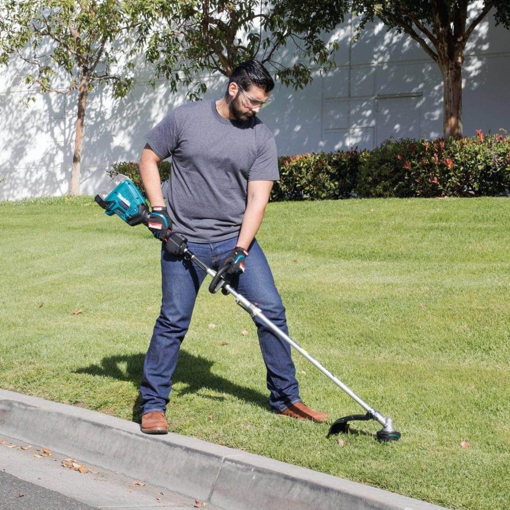 man using Makita XUX01ZM5
