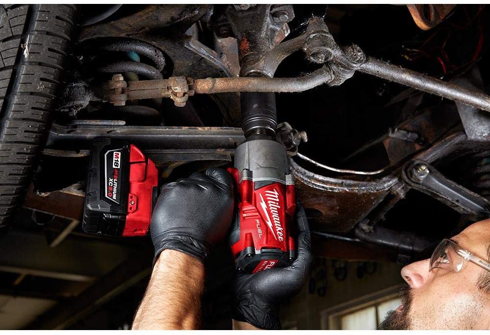 man using Milwaukee M18 Cordless Impact Wrench