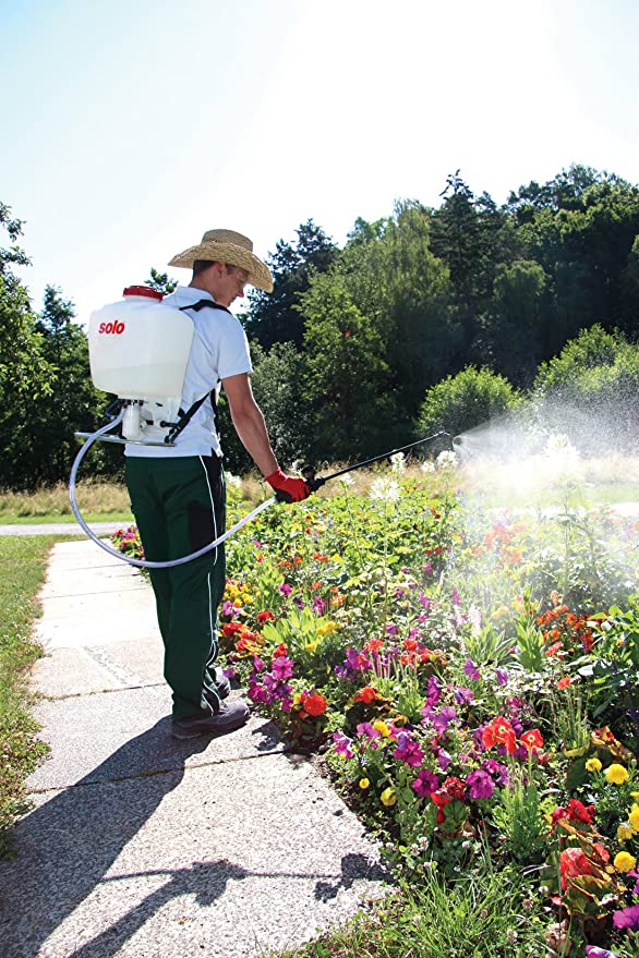 man using Solo 425 Professional Piston Backpack Sprayer