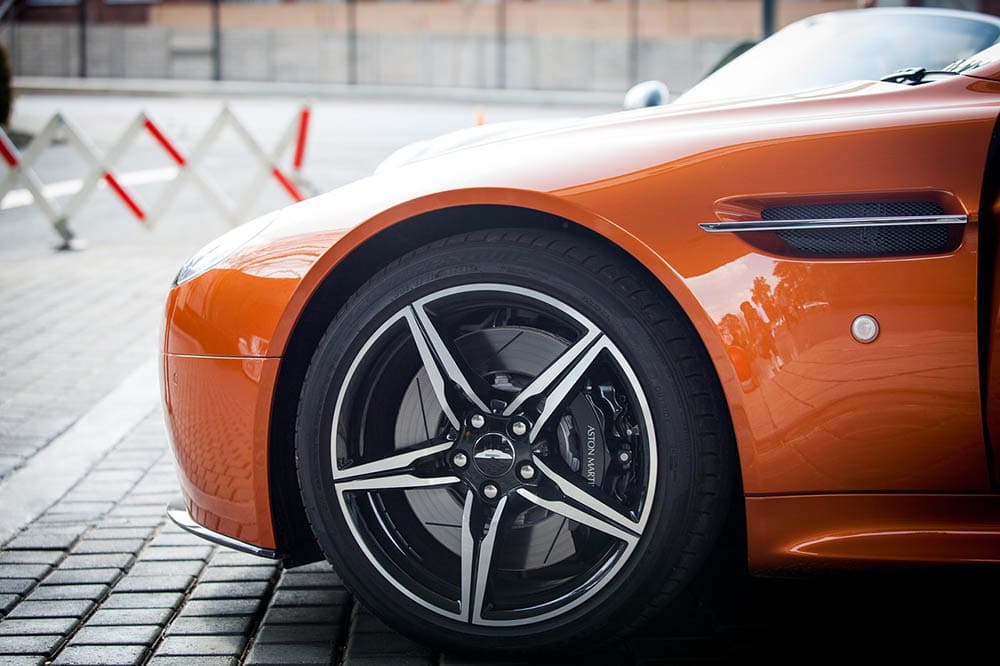 orange Aston Martin car