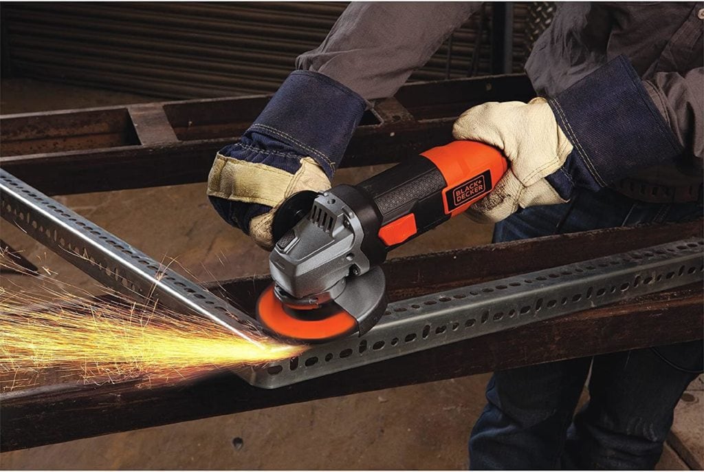 person using BLACK+DECKER BDEG400 Angle Grinder