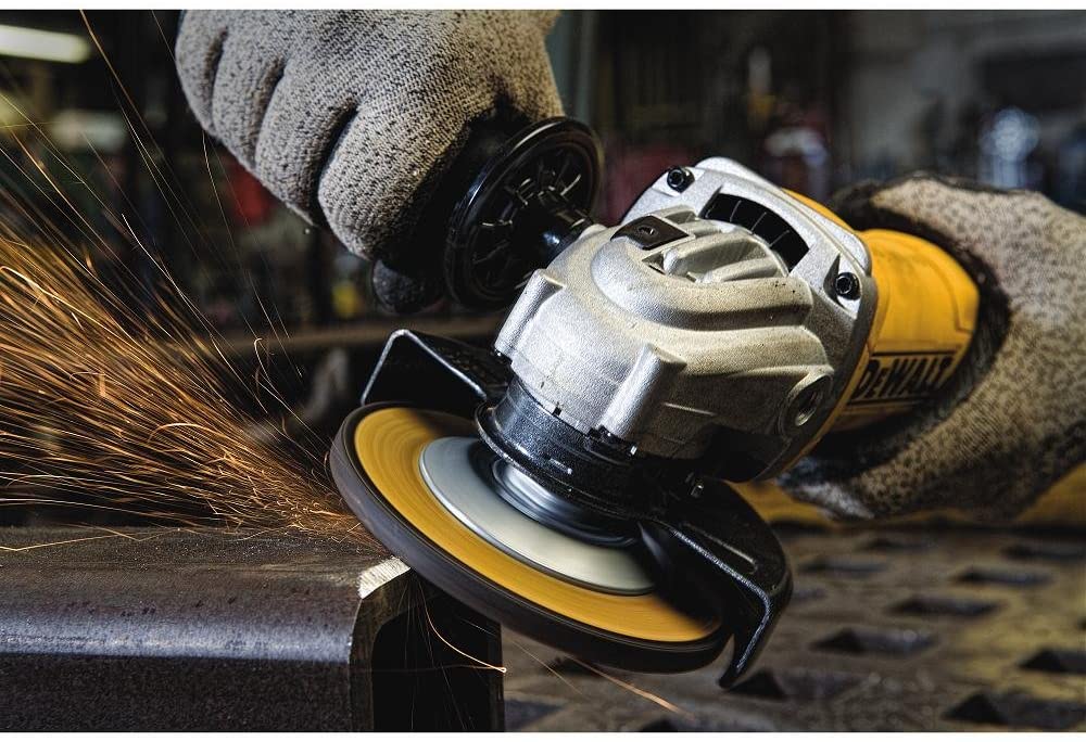 person using DEWALT Angle Grinder Tool