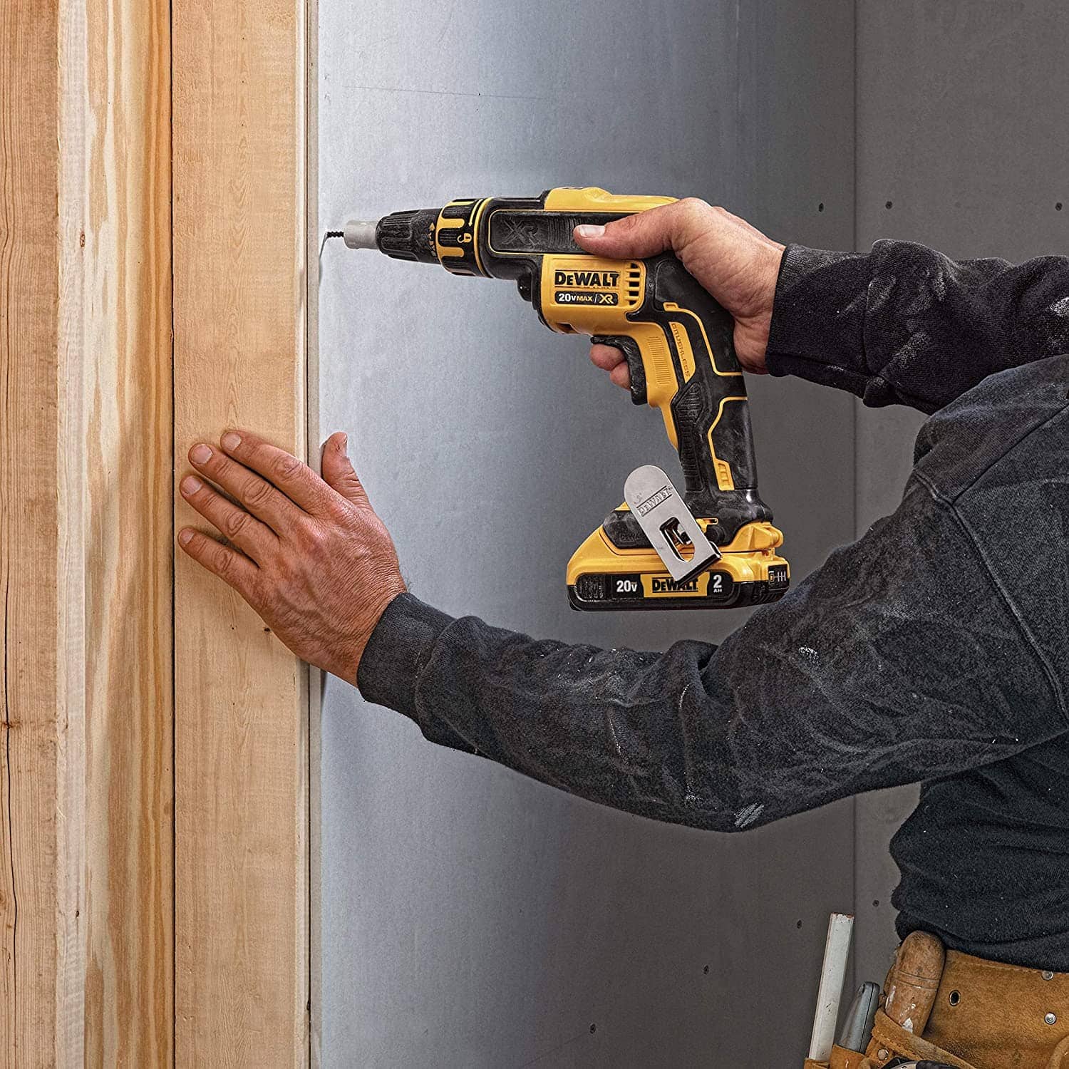 person using DEWALT DCF620B Dry-Wall Screw Gun