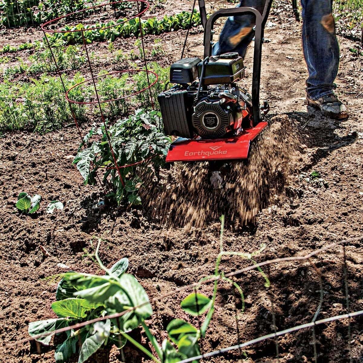person using Earthquake 20015 Versa Front Tine Tiller