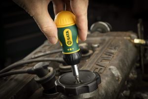 person using SATA 19-in-1 Multipurpose Ratcheting Screwdriver