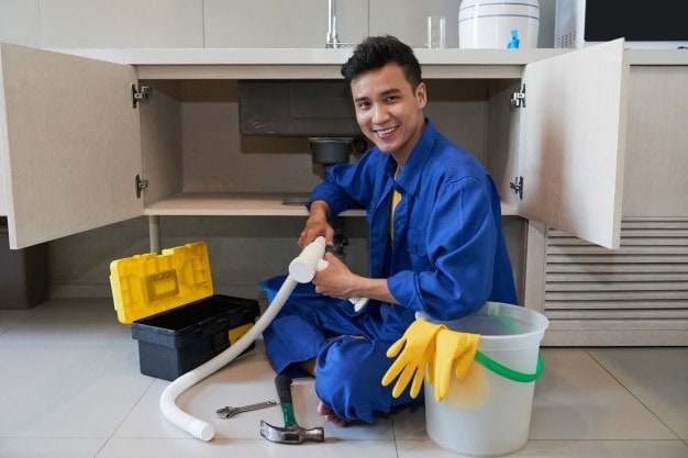 smiling plumber
