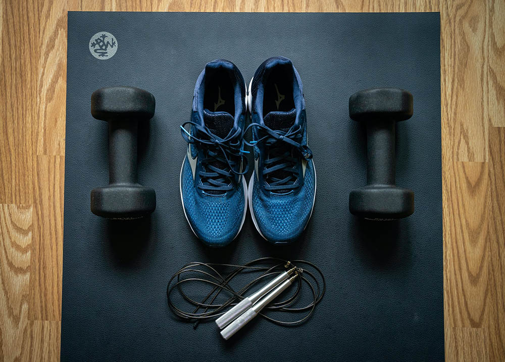 sneakers and workout equipment
