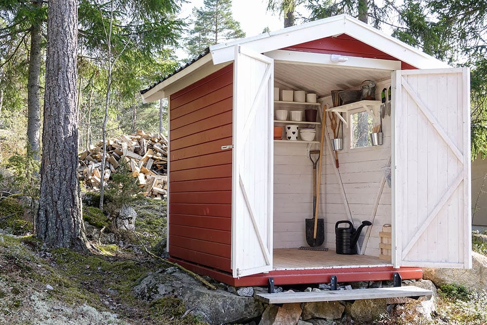 Storage shed filled with garden tools