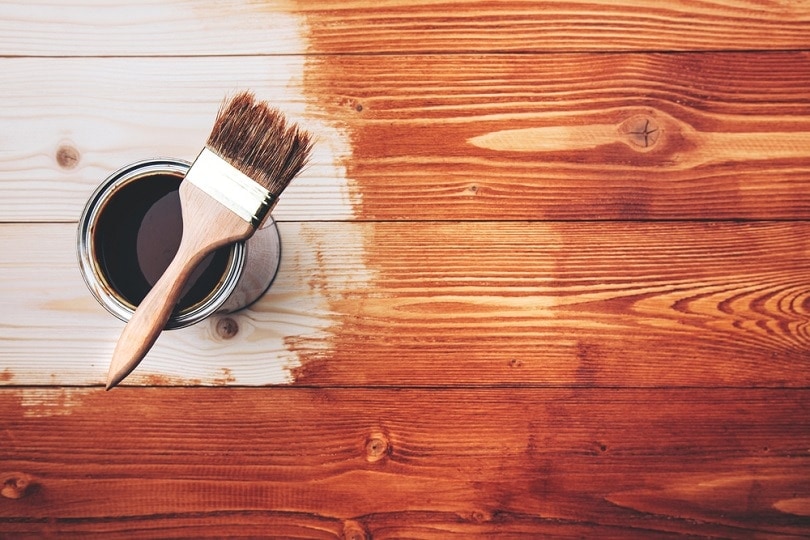 Varnishing a wooden shelf_Efetova Anna_shutterstock