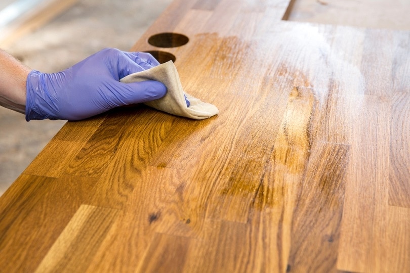wiping-wood_FotoHelin_shutterstock