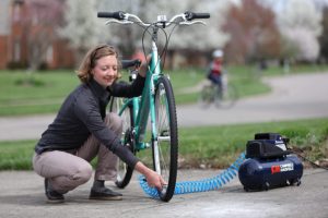 woman using Campbell Hausfeld FP209499AV Air Compressor