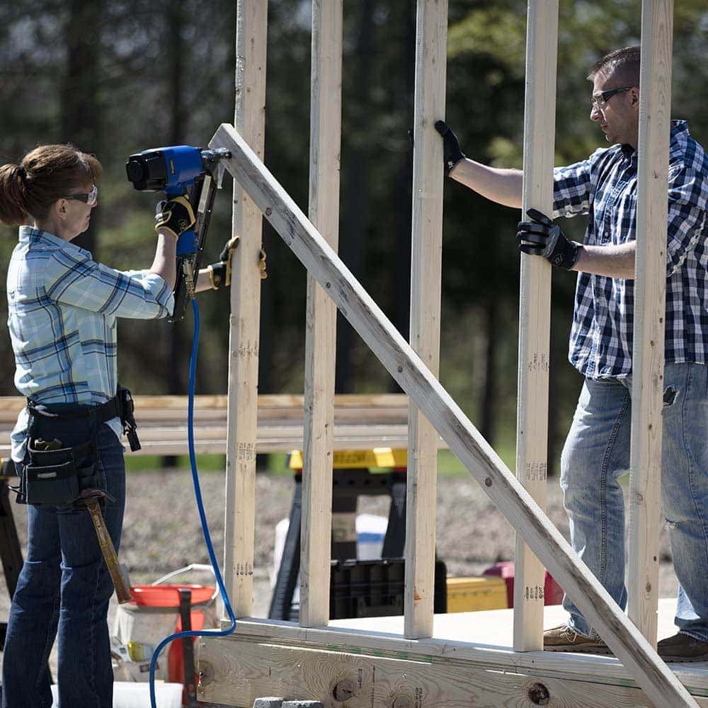 woman using Campbell Hausfeld PA117701AV Air Hose