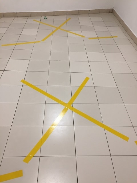 X-mark-on-the-tile-floor_Shafry-James_shutterstock