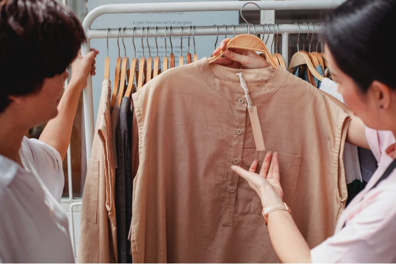 two people haggling over a shirt