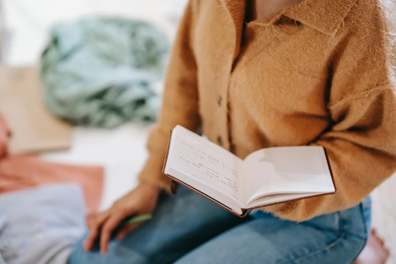 woman creating list of inventory